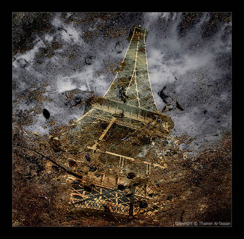 Eiffel Puddle Reflection